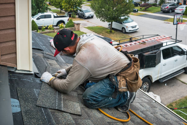 Professional Roofing technician working in Homestead, IA